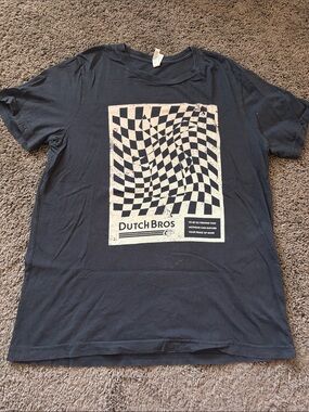Dutch Bros Black Tee with Cream Optical Checkered Graphic